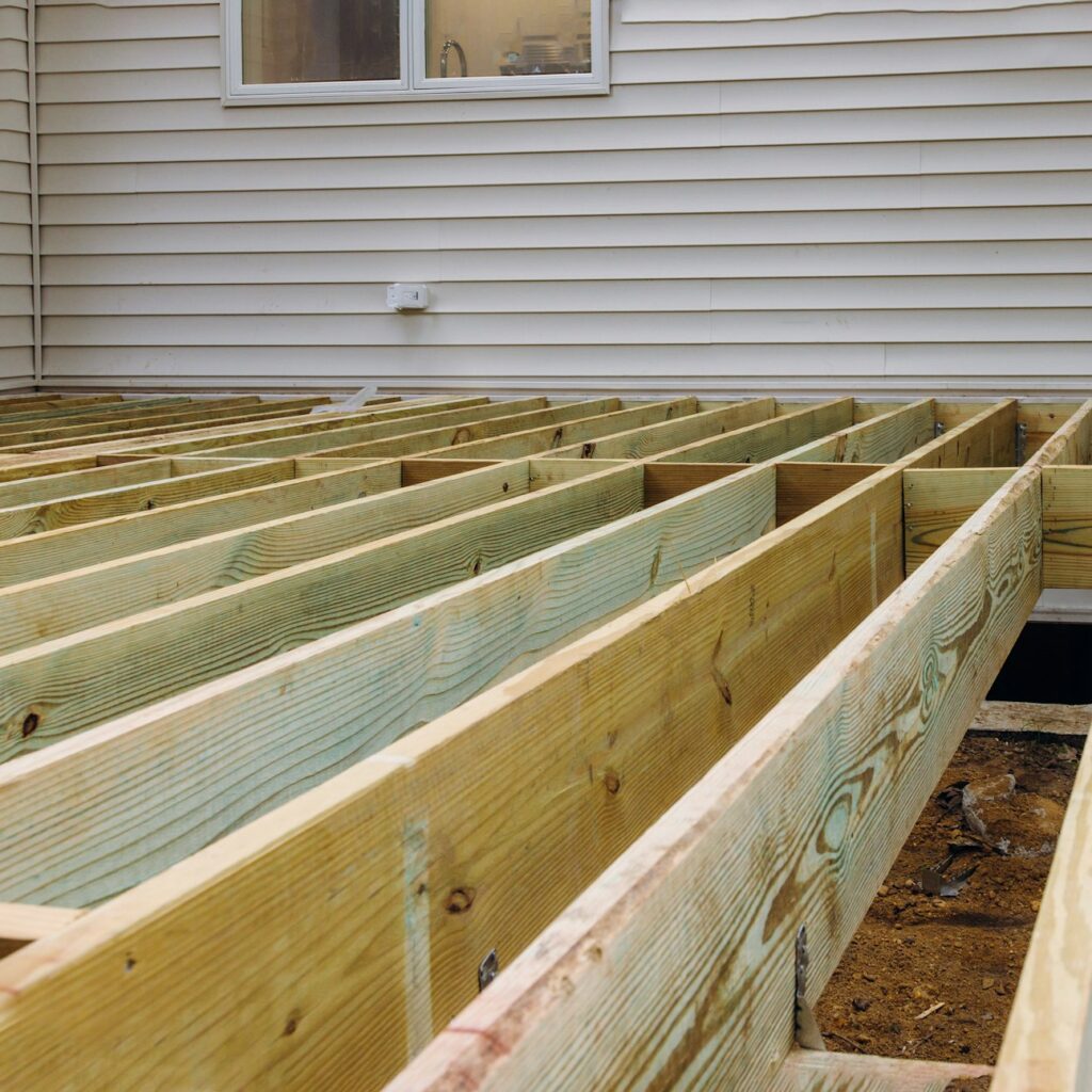 Installing deck patio construction. boards with above ground deck